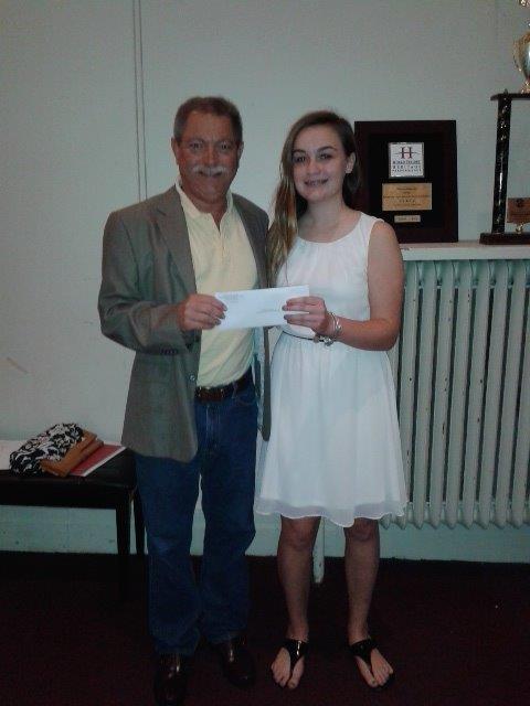 Paul Twardy presents Hannah Walsh with $1000 scholarship.